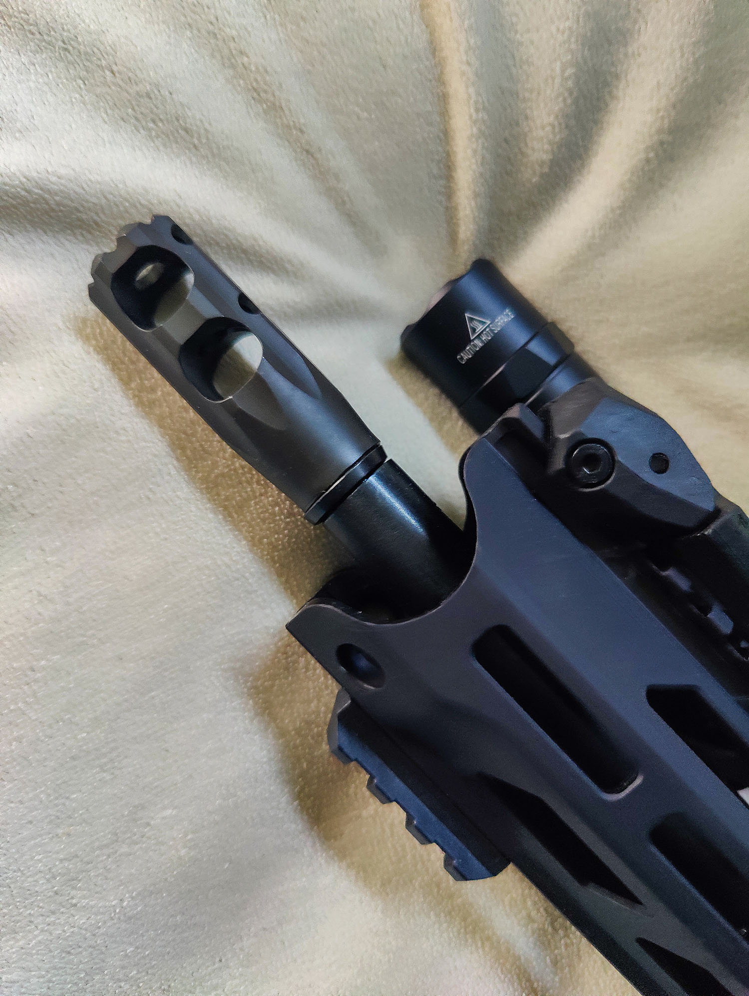 Diamondback Firearms DB15 new Obsidian upper muzzle brake and Surefire light